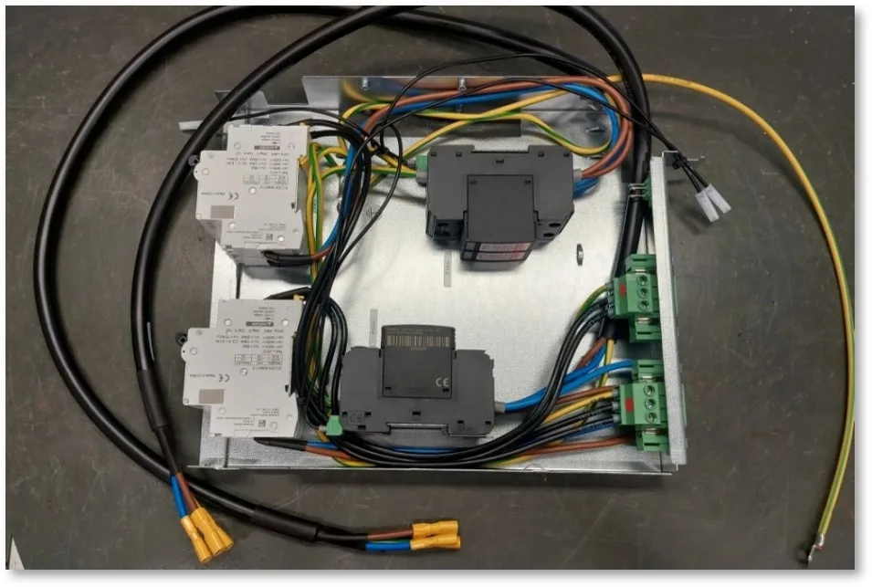 SGS Technologies technician performing system installation and testing